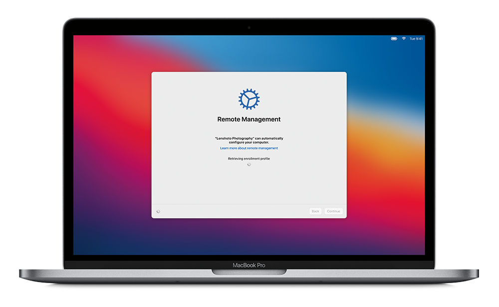 A MacBookPro displaying a message about Remote Management. A MacBookPro displaying a message about Remote Management.